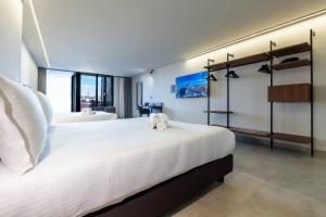 Postel nebo postele na pokoji v ubytování Onyx Hotel + 37 fotografií
