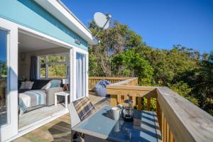 Balkón nebo terasa v ubytování Punga Cottage - Bookahome