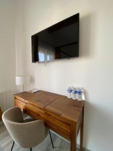 TV a/nebo společenská místnost v ubytování O Bain Soleil