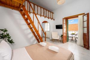 Postel nebo postele na pokoji v ubytování Lito Studio + 7 fotografií