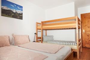 Posteľ alebo postele v izbe v ubytovaní Kachelofenwohnung Pölzleitner