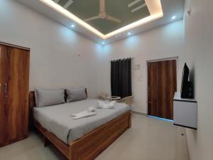 Postel nebo postele na pokoji v ubytování Limeport Resort