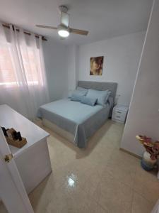 Postel nebo postele na pokoji v ubytování Apartamento Acapulco III Primera linea