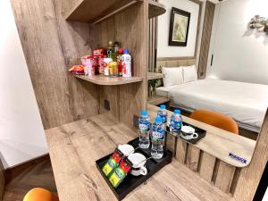 En eller flere senge i et værelse på G-Apartment & Hotel + 36 billeder