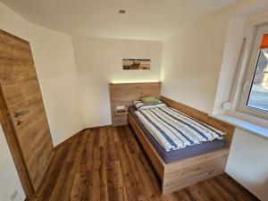 Postel nebo postele na pokoji v ubytování Günthers Apartments