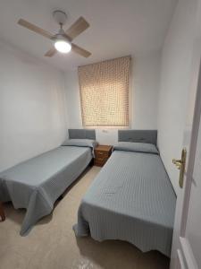 Postel nebo postele na pokoji v ubytování Apartamento Acapulco III Primera linea