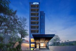 a building with an akron sign on top of it at Aston Gejayan Yogyakarta Hotel & Conference Center in Yogyakarta