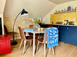 Kuchyň nebo kuchyňský kout v ubytování Apartmán U Mluvících Kamenů