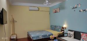 Postel nebo postele na pokoji v ubytování Sunny Hanoi Homestay
