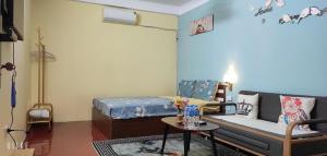 Postel nebo postele na pokoji v ubytování Sunny Hanoi Homestay