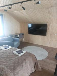 Postel nebo postele na pokoji v ubytování Owl's Nest Chalet