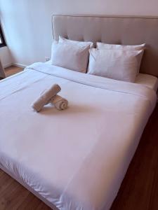 Postel nebo postele na pokoji v ubytování Ceylonz Suites by ROOMY