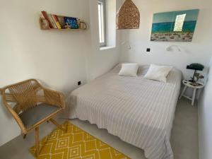 Ένα ή περισσότερα κρεβάτια σε δωμάτιο στο Clepsydra Residence