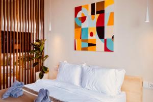 TheHub Pererenan Coworking, Pool and Rooftop客房内的一张或多张床位