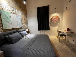 Postel nebo postele na pokoji v ubytování TasEV Guesthouse