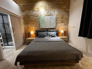 Postel nebo postele na pokoji v ubytování TasEV Guesthouse