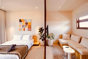 TheHub Pererenan Coworking, Pool and Rooftop客房内的一张或多张床位