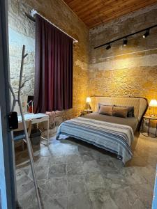 Postel nebo postele na pokoji v ubytování TasEV Guesthouse