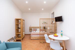 Et tv og/eller underholdning på Domus 116 Ortigia by Ortigiaapartments