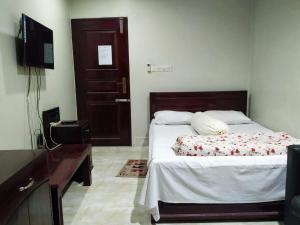 Hotel Mohsin Plaza客房内的一张或多张床位