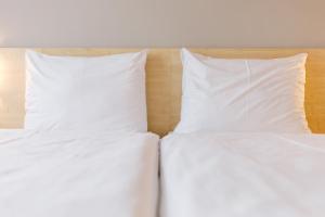 Postel nebo postele na pokoji v ubytování Hotel Vista