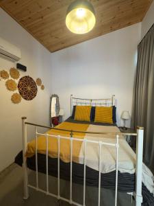 Postel nebo postele na pokoji v ubytování TasEV Guesthouse