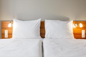 Postel nebo postele na pokoji v ubytování Hotel Vista + 37 fotografií