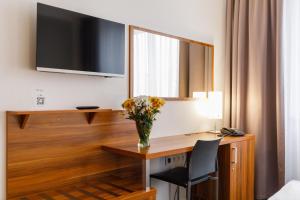 TV a/nebo společenská místnost v ubytování Hotel Vista