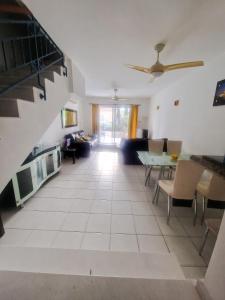 a large living room with a table and chairs at Viktoria Houses Anarita in Anarita