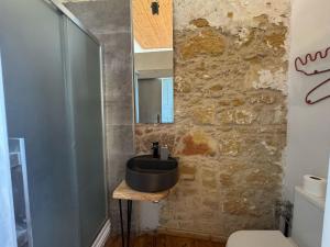 Koupelna v ubytování TasEV Guesthouse