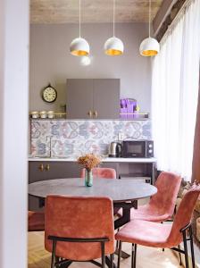 A cozinha ou kitchenette de Guesthouse of Manoni Ratiani