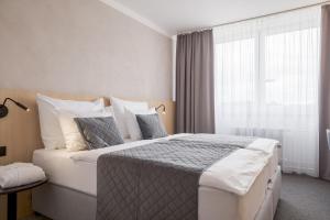 Postel nebo postele na pokoji v ubytování Hotel Vista