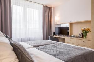 Postel nebo postele na pokoji v ubytování Hotel Vista