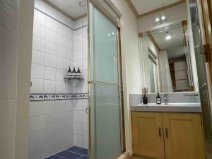 a bathroom with a shower and a sink at NewsenseB-1sec from Hongdae Sub&wifi in Seoul