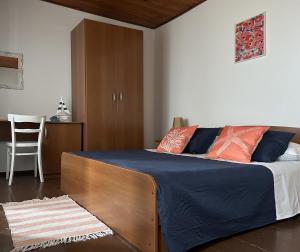 Ένα ή περισσότερα κρεβάτια σε δωμάτιο στο Apartmani Ruvo 1