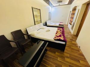 Letto o letti in una camera di Millenium Residency