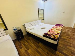 Letto o letti in una camera di Millenium Residency