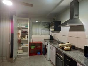Kuchyň nebo kuchyňský kout v ubytování apartamento Daimuz playa