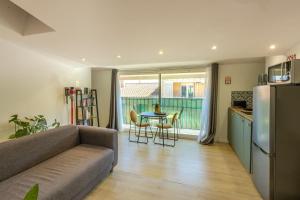 Kuchyň nebo kuchyňský kout v ubytování Farigoule Appartement rénové avec balcon + 9 fotografií