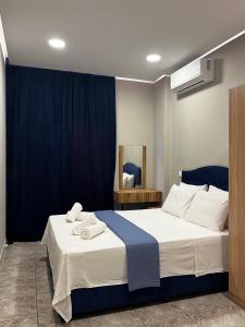 Postel nebo postele na pokoji v ubytování Sapphire home