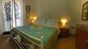 Postel nebo postele na pokoji v ubytování Casa Dorina charme e comfort a 100 m dal mare