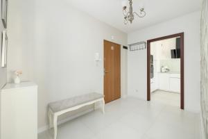 Posteľ alebo postele v izbe v ubytovaní Jasnoszary Apartament Sun Seasons 24 w Kołobrzegu Blisko Morza by Noclegi Renters