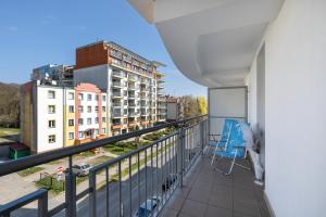 Balkón alebo terasa v ubytovaní Jasnoszary Apartament Sun Seasons 24 w Kołobrzegu Blisko Morza by Noclegi Renters