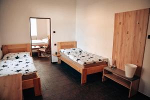 Gulta vai gultas numurā naktsmītnē Apartmány u Zdeničky