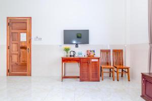 TV a/nebo společenská místnost v ubytování Magnolia Hotel Cam Ranh
