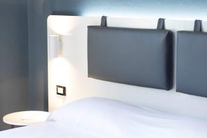 Elba Vibe Smart Hotel客房内的一张或多张床位