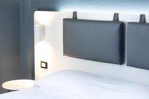Elba Vibe Smart Hotel客房内的一张或多张床位