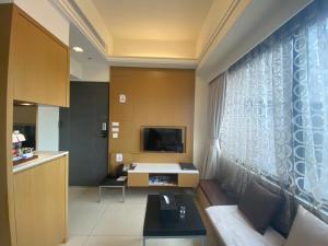 TV a/nebo společenská místnost v ubytování AJ Residence 安捷國際公寓酒店