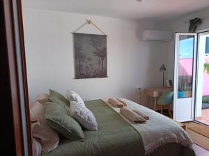 En eller flere senge i et værelse på Apartamento La Bella Vista ATBA00361