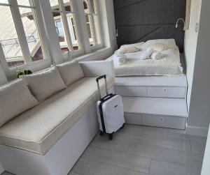 Posteľ alebo postele v izbe v ubytovaní Apartament White R parking w cenie!!!